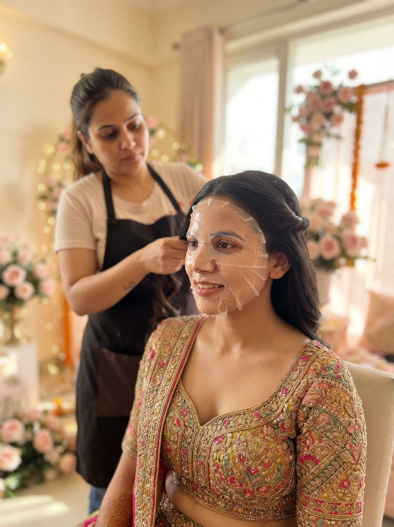 A bride in India wearing a hydrogel face mask while getting her hair styled for a wedding ceremony.